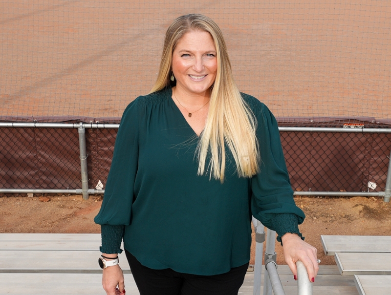 JoAnne Bullard of Rowan University poses on campus at the softball field